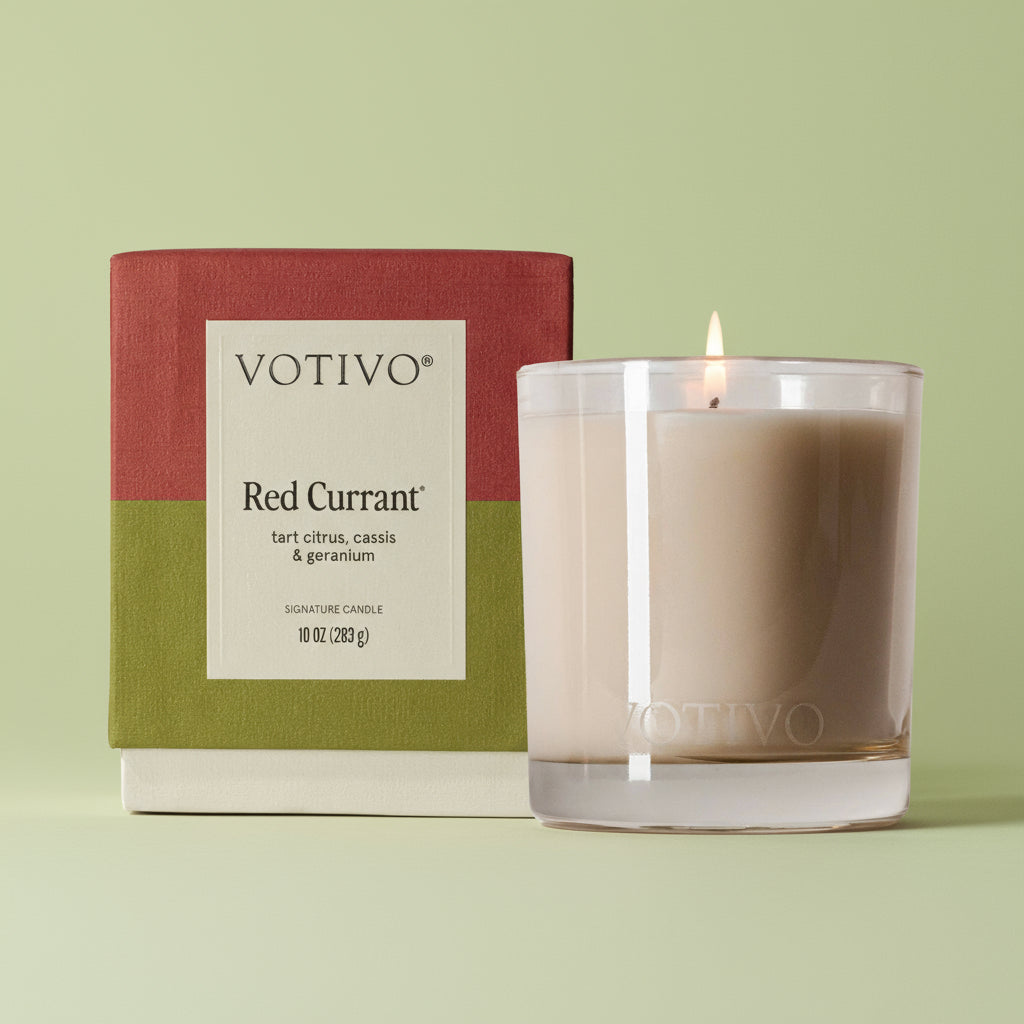Votivo Red Currant candle with packaging on a white background