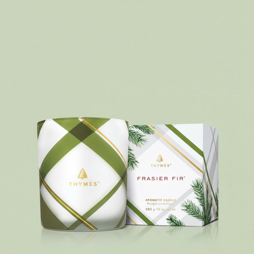 Thymes Frasier Fir candle and packaging on a white background