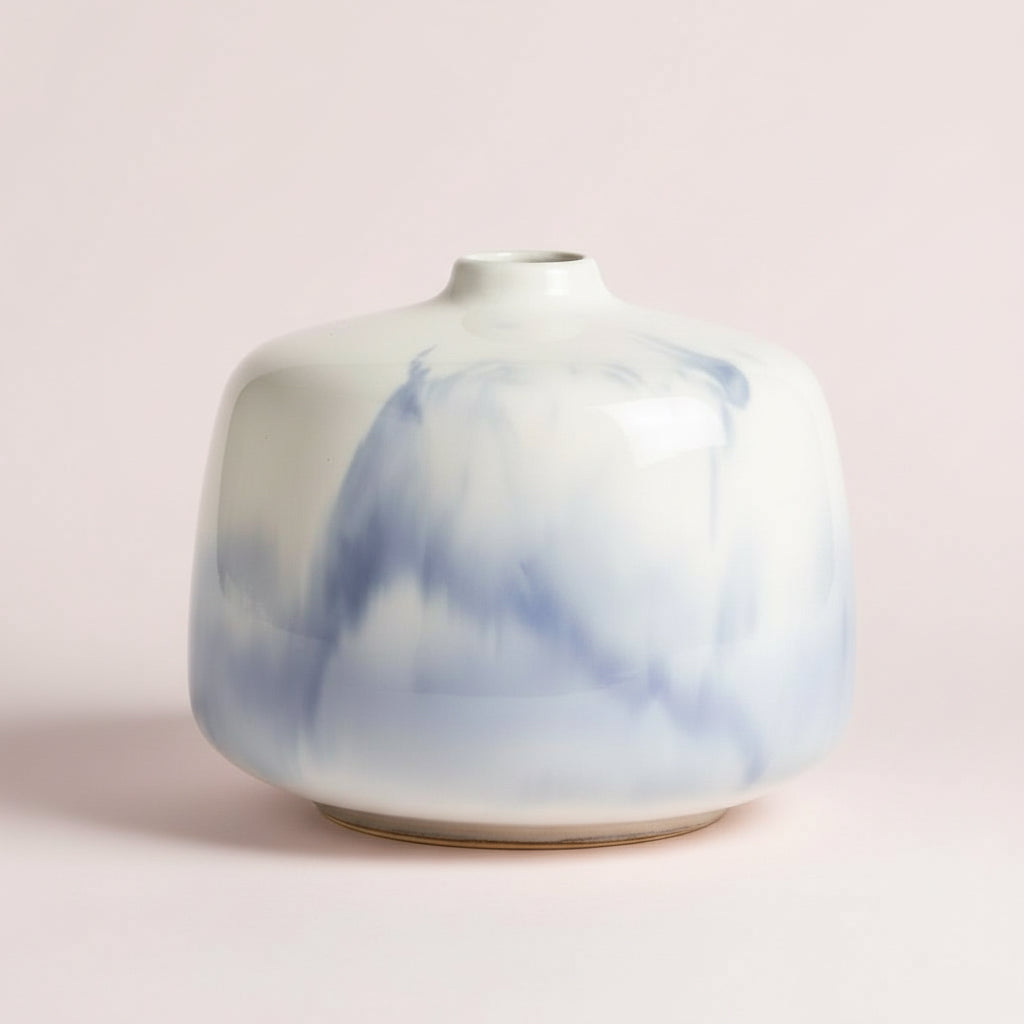 Handcraftedstonewarevasewithacreamywhiteceramicglazeandbrushstrokedesign_perfectforaddingcoastalcharmandsophisticationtoanyroom.