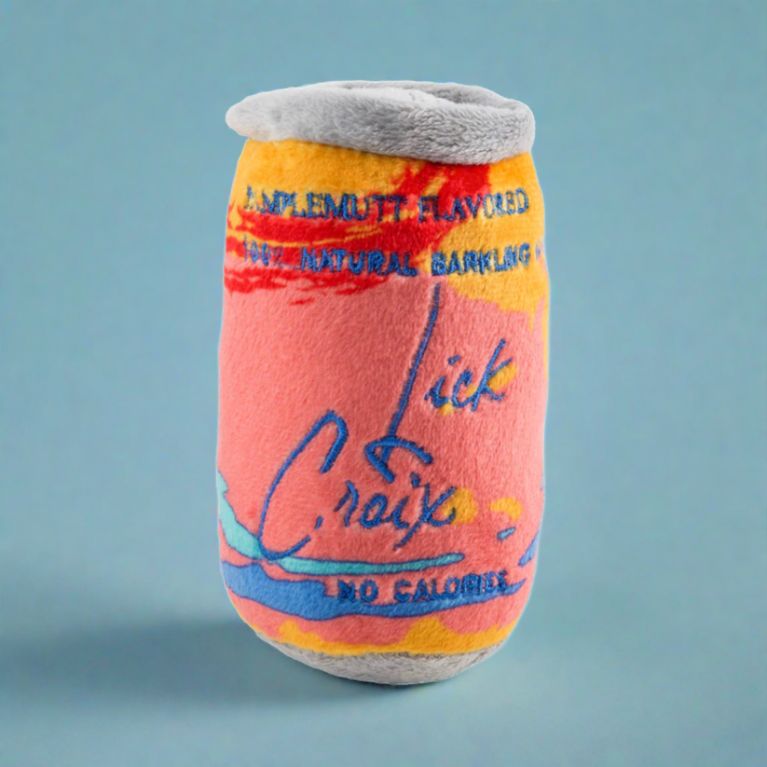 Plush dog toy designed to resemble a sparkling drink can, featuring a soft exterior and hidden squeaker, perfect for playful pups who enjoy fun, quirky toys.