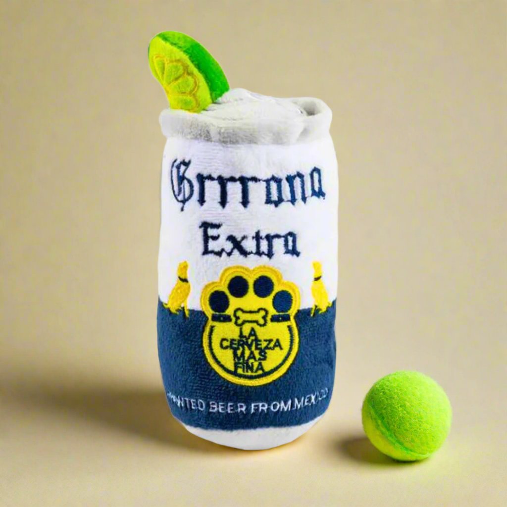 Plush_dog_toy_shaped_like_a_GRRRona_can_with_a_soft_exterior_and_hidden_squeaker_perfect_for_playful_pups_looking_to_add_fun_and_excitement_to_their_playtime.