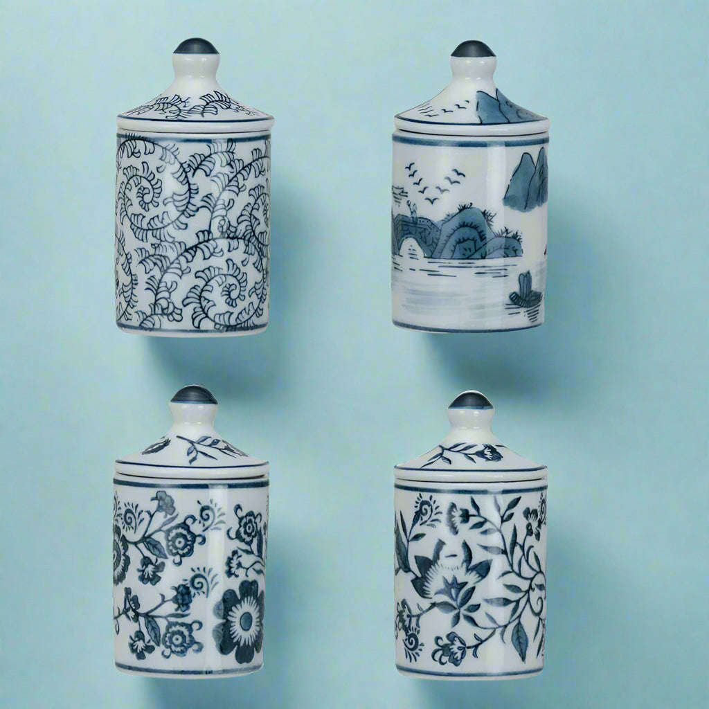 Hand-painted blue and white stoneware spice jar with crackle glaze finish.