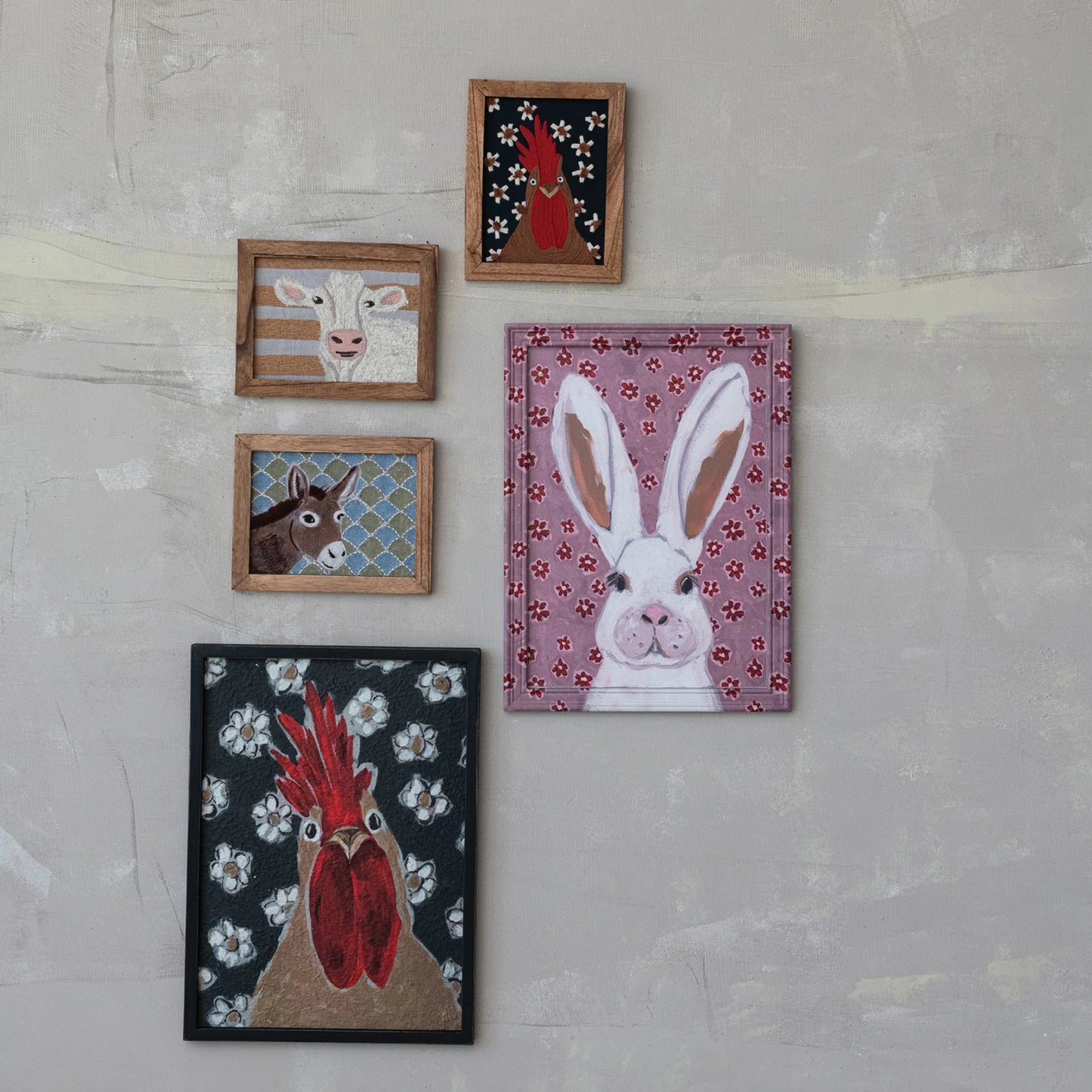 Framed wall art featuring an animal illustration against a patterned background, encased in a rustic wood frame."