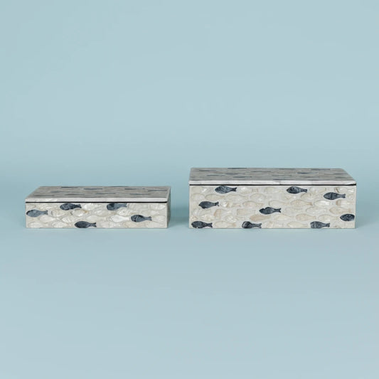 Two decorative boxes with fish pattern on a white background