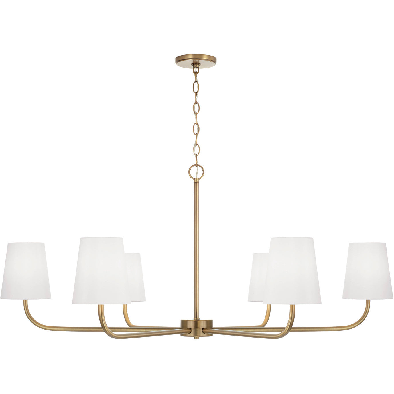 Aged brass chandelier with six white fabric shades, styled with modern curves and timeless warmth.