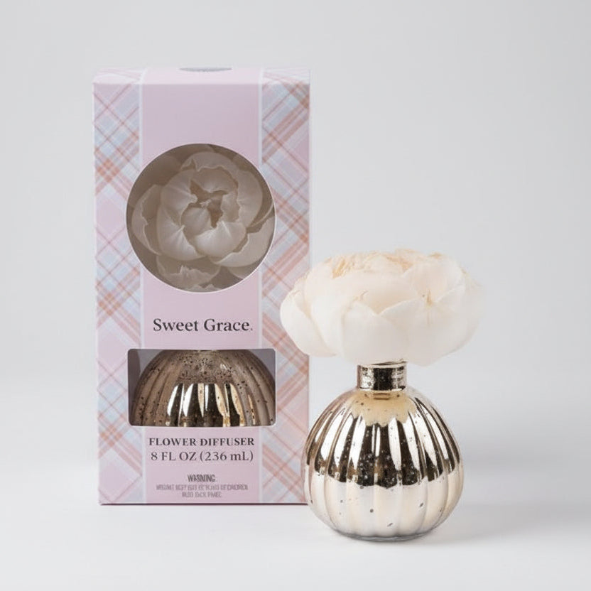 Flower diffuser with a white rose and packaging labeled 'Sweet Grace' on a white background