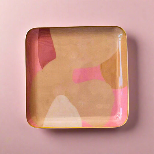 Abstract_enameled_metal_tray_featuring_a_blend_of_pink_brown_and_tan_colors_ideal_for_serving_or_as_a_decorative_accent_adding_a_modern_artistic_touch_to_any_space.