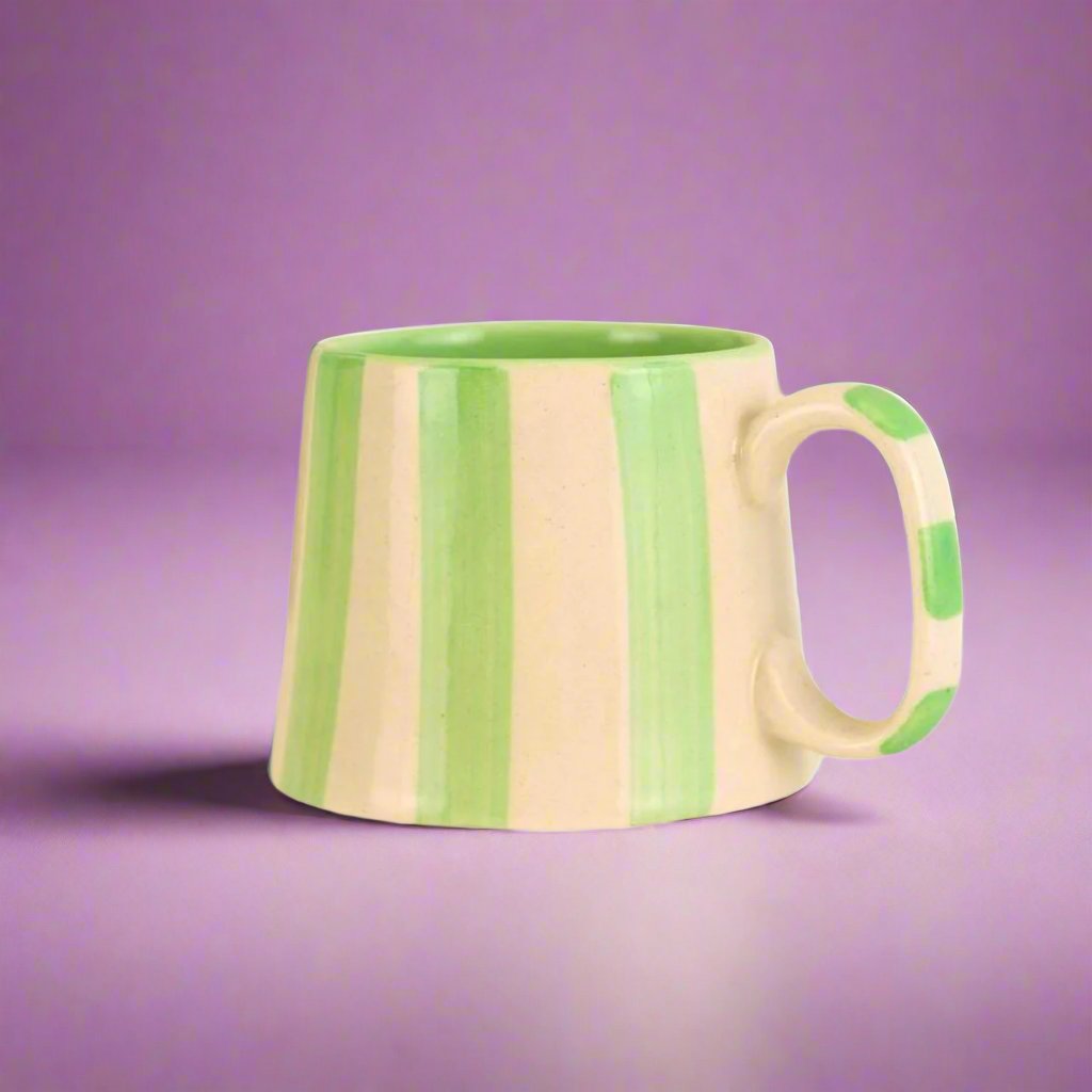 Ceramicmugwithboldgreenstripes_perfectforaddingaplayfulandstylishtouchtoanykitchenorcoffeeroutine.