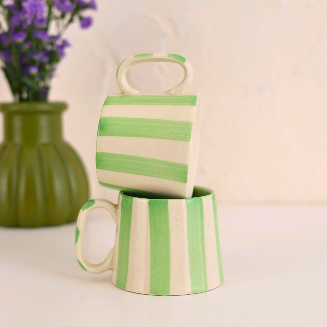 Ceramicmugwithboldgreenstripes_perfectforaddingaplayfulandstylishtouchtoanykitchenorcoffeeroutine.copy