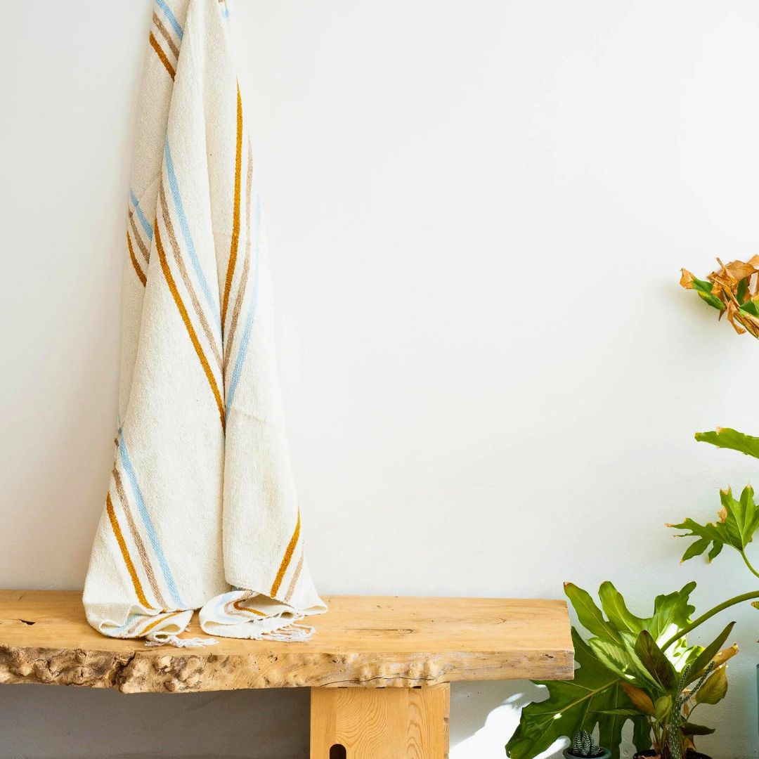 Coastal-themed_throw_blanket_made_from_sustainable_recycled_materials_perfect_for_adding_warmth_and_eco-friendly_style_to_any_living_space.copy3