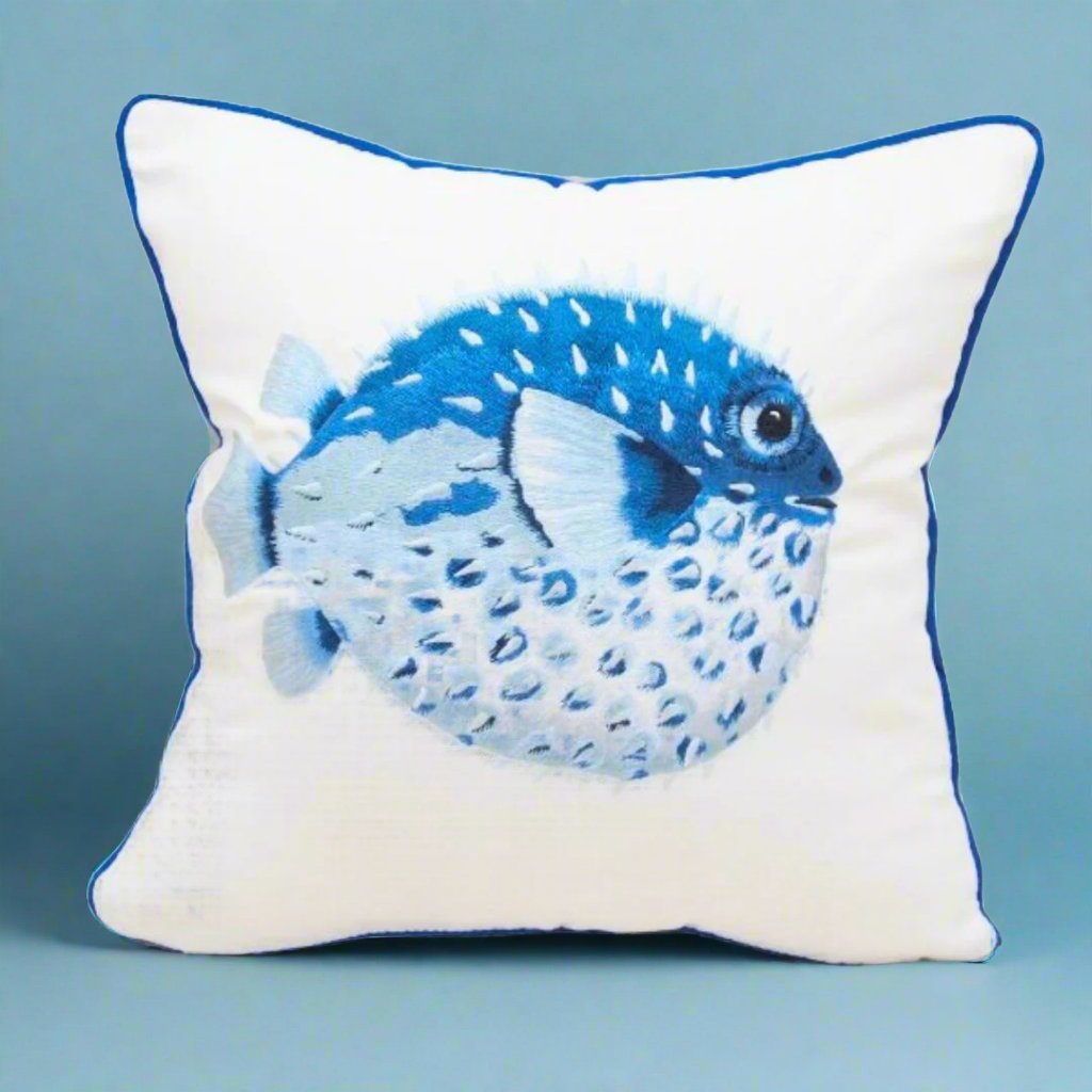 Coastal-themedpillowshapedlikeapufferfish_featuringaplayfuldesignandsoft_high-qualitymaterials_idealforaddingafunandwhimsicaltouchtoanyroom.