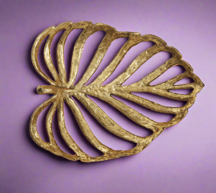 Golden Leaf Cast Iron Tabletop Decoration with intricate leaf design, measuring 12.25x10 inches, in a luxurious gold finish. Ideal for adding sophistication and warmth to any tabletop.