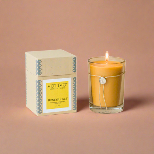 Honeysuckle Glass Candle, featuring a sweet, floral fragrance of blooming honeysuckle, perfect for creating a soothing and elegant atmosphere in any room.
