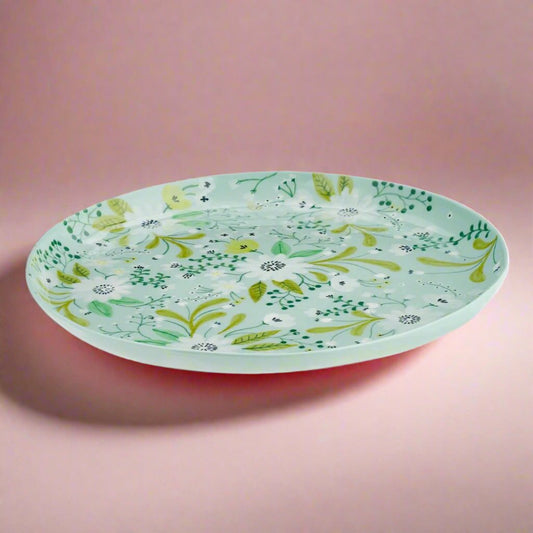 Largeservingplatterfeaturingacolorfulfloraldesign_idealforaddingacheerfulandwhimsicalelementtoanydiningorentertainingsetup.