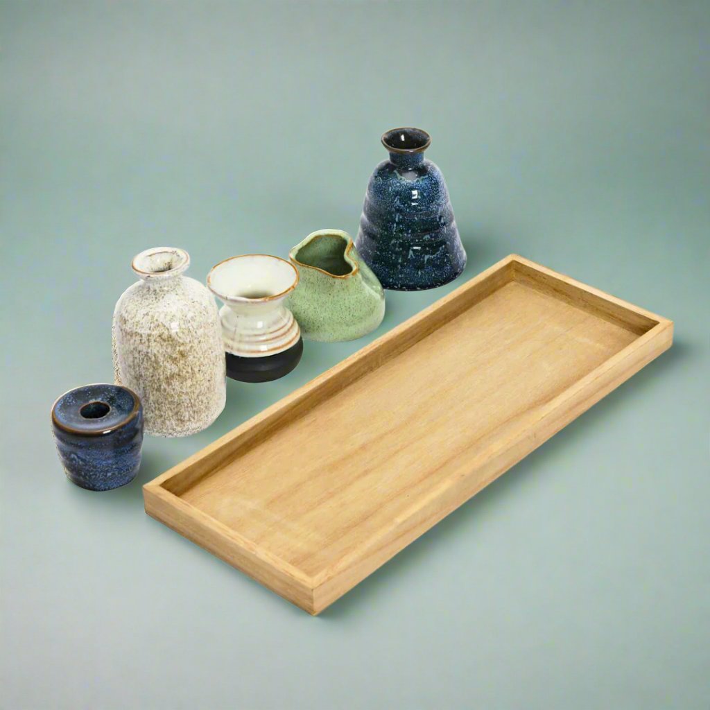 Mango_wood_tray_set_with_1_taper_holder_and_4_vases_featuring_unique_natural_variations_ideal_for_adding_rustic_charm_and_versatile_functionality_to_your_home_decor.