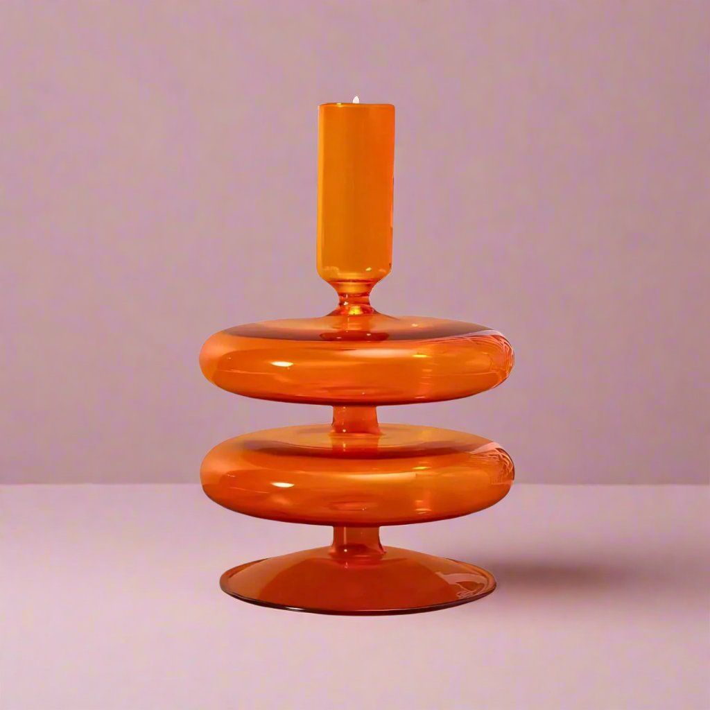 Orangeretrowavyglasscandleholder_designedtoaddavibrant_vintagetouchandwarmglowtoanytabletopordecorsetting.