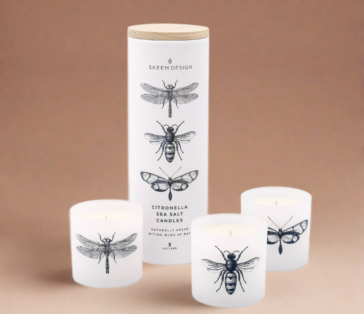 Set of three Sea Breeze Citronella Candles, each in a sleek container, infused with ocean air, citronella, sea salt, and jasmine, designed to repel insects and create a tranquil outdoor ambiance.