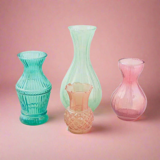 Setof4smalldebossedglassvasesinmultiplecolors_perfectforaddingaplayfulanddecorativeaccenttoanyroomorfordisplayingsmallflowers.