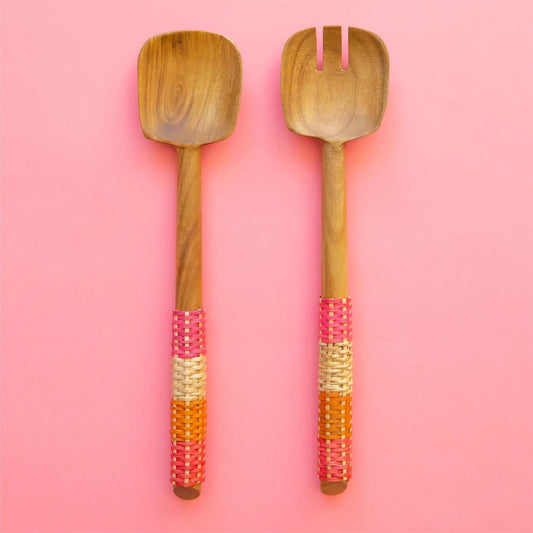 Setofteakwoodsaladserverswithvibrantpinkhandles_perfectforaddingastylishandmoderntouchtoanydiningtablewhileservingsalads.