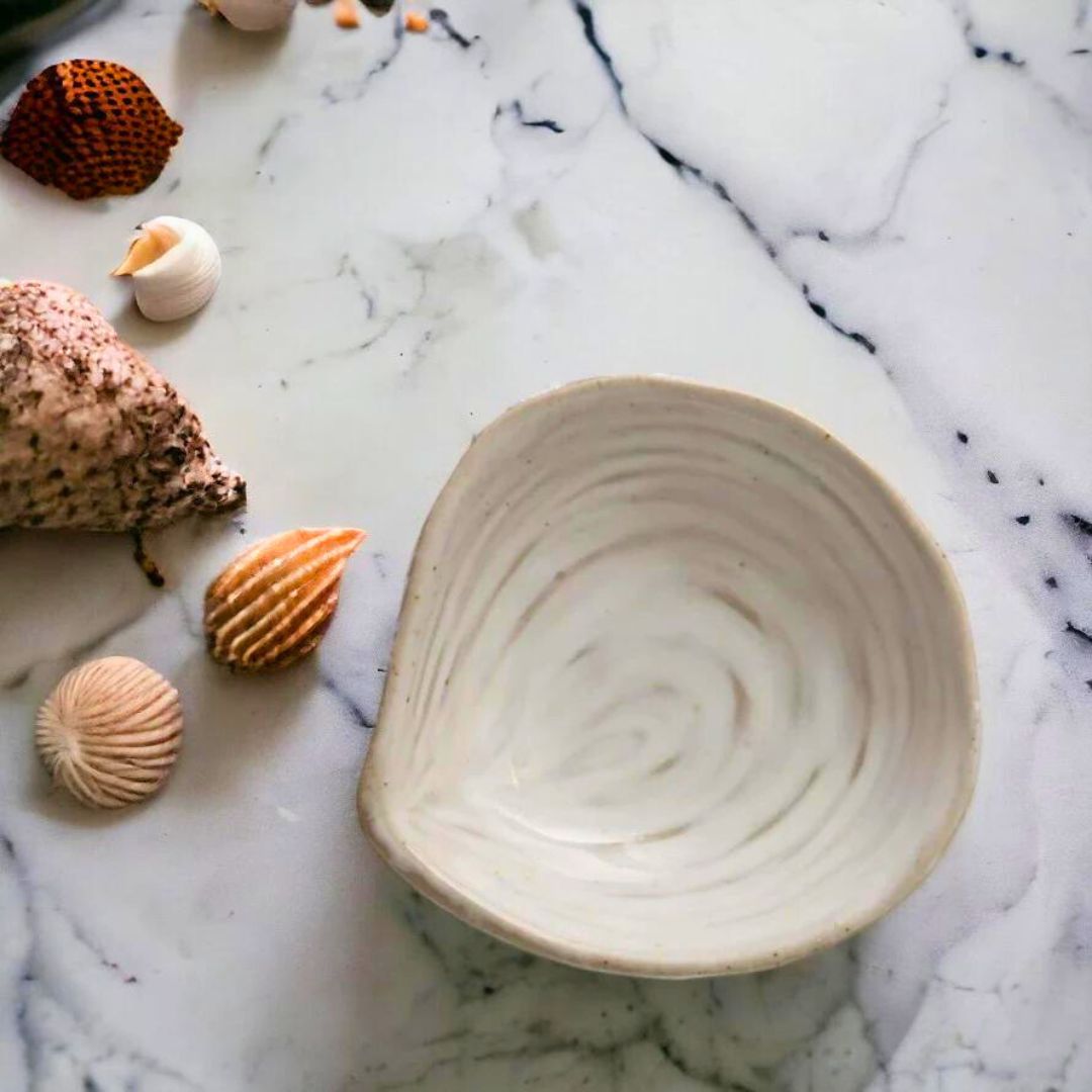 White_stoneware_clam_dish_with_a_realistic_clamshell_design.copy