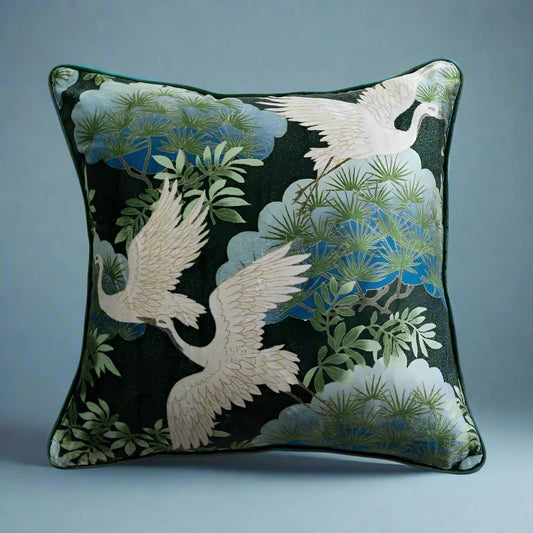 18-inch velvet pillow with crane print and piped edges, adding bold texture and pattern to décor.

