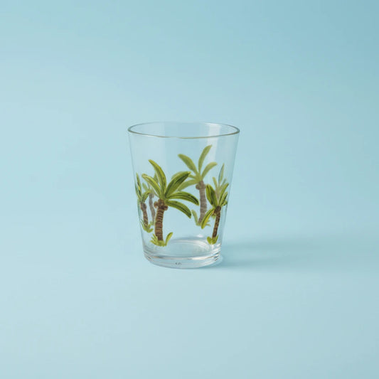 Clear glass with palm tree design on a white background