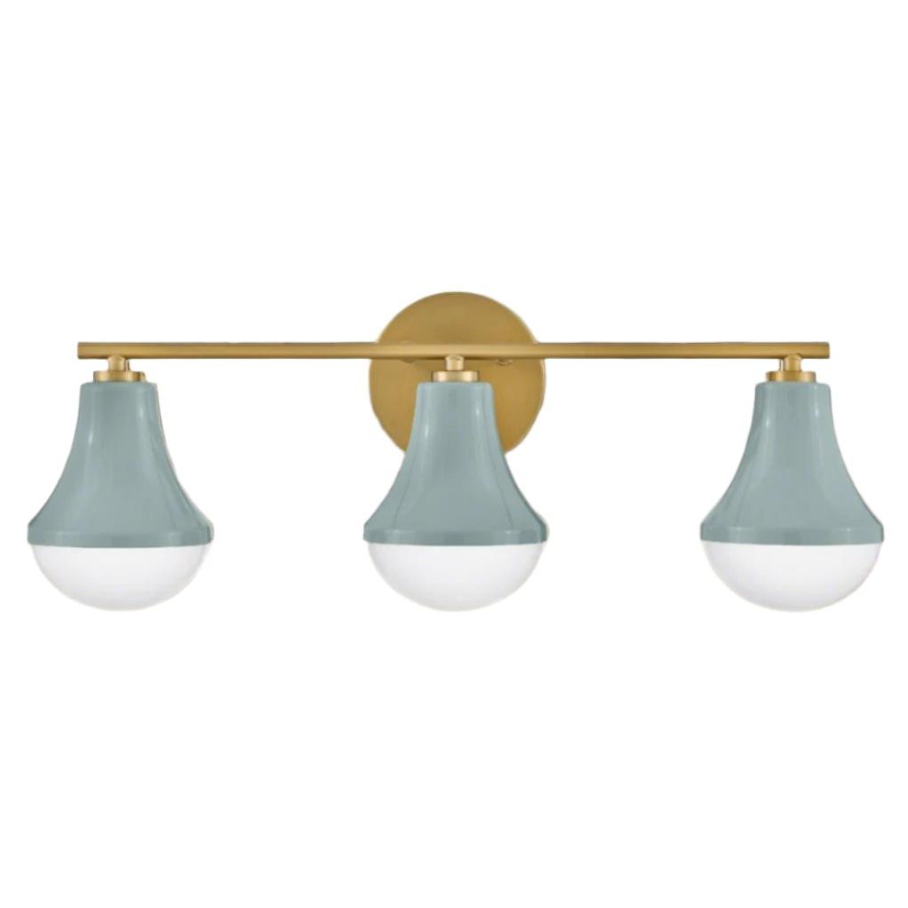 Seafoam Serenity LED Vanity Light featuring curved opal glass and a seafoam finish. Offers energy-efficient lighting with a stylish and contemporary design.