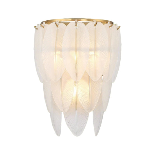 Hollywood Feather Sconce from the Boa Collection, 10.5x14 inches, with frosted glass feathers and Warm Brass finish. Accommodates three E12 bulbs, adding a touch of Old Hollywood charm and modern sophistication to any room.